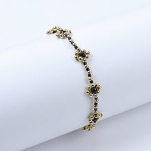 Cargar imagen en el visor de la galería, Pulsera Bolitas Flores Negro y Dorado