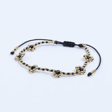 Cargar imagen en el visor de la galería, Pulsera Bolitas Flores Negro y Dorado